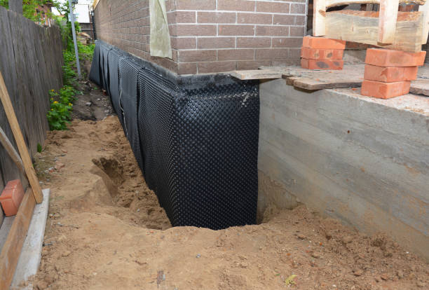 SJ Waterproofing Pros technician performing targeted Exterior Waterproofing assessment in Cropwell, AL